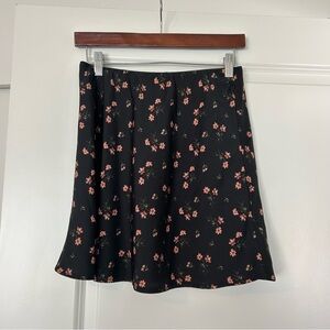 Hollister satin floral ultra high rise mini skirt in black 
Size small
